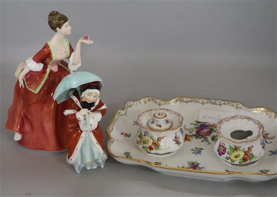A Dresden ink stand and two Royal Doulton figures
